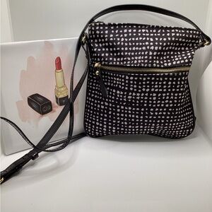 Cross body purse. New. Black and white pattern with Gold Plated Hardware